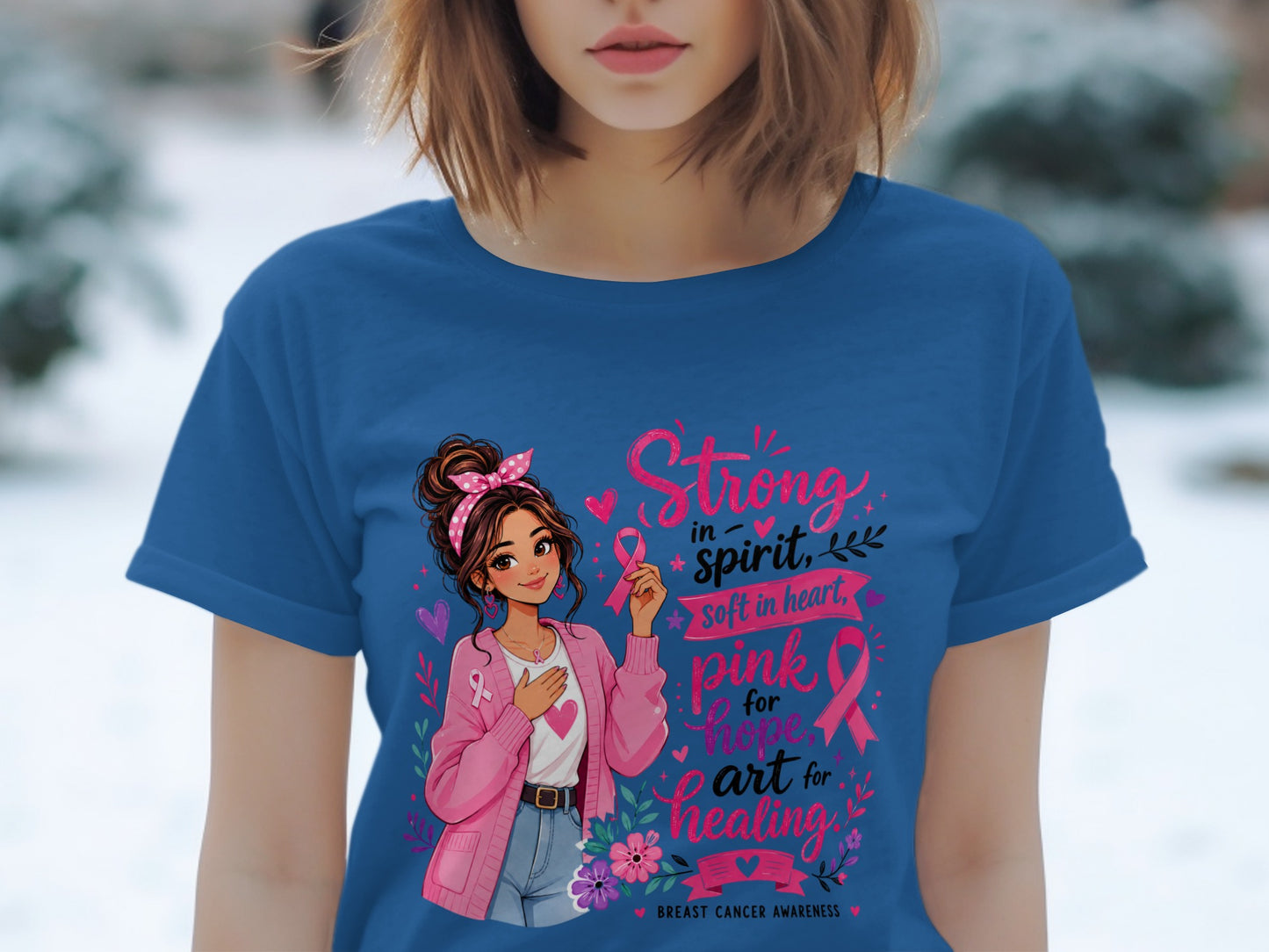 Blue t-shirt with girl holding pink ribbon and text about breast cancer awareness.