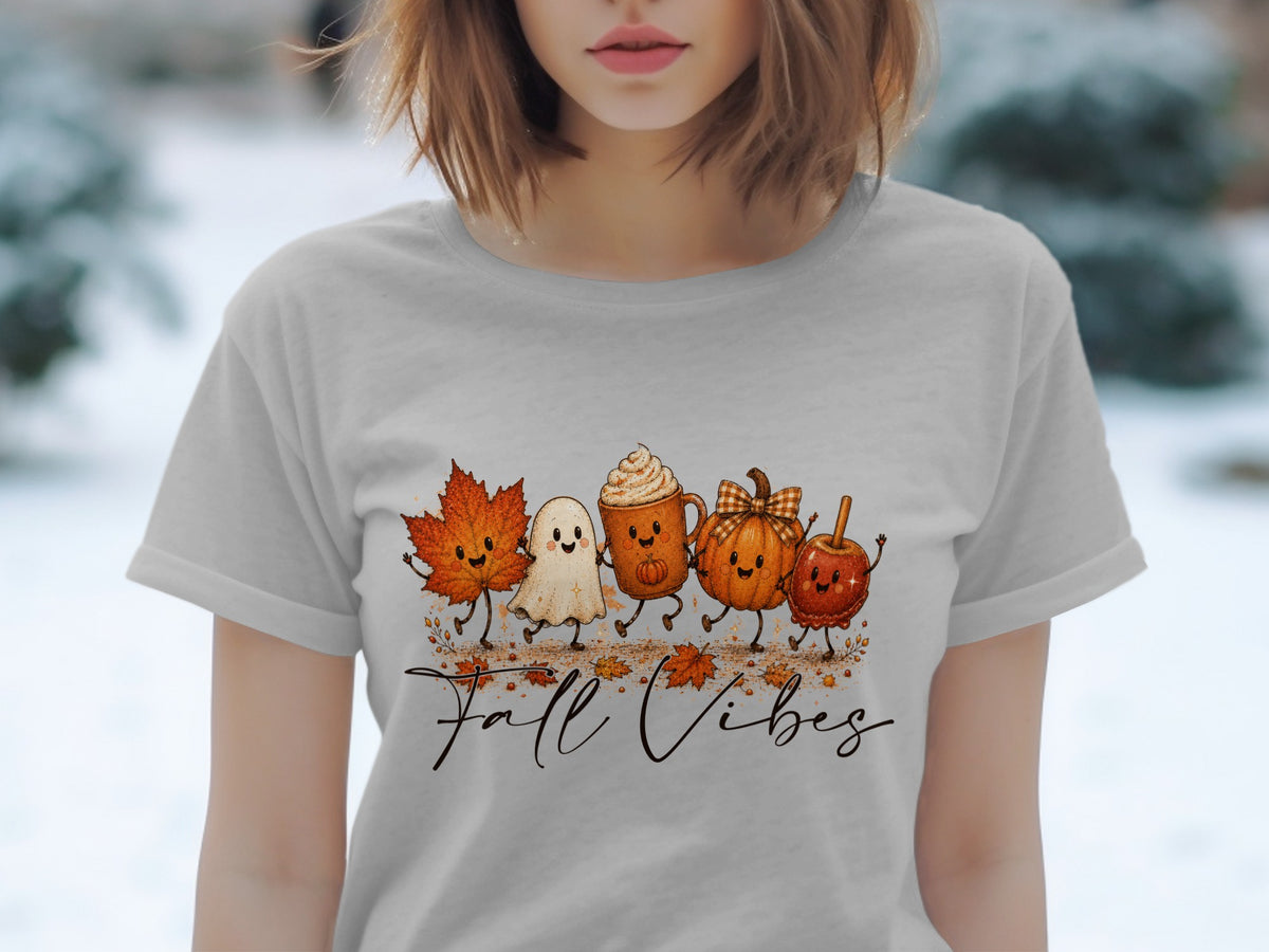 Cute fall characters and text "Fall Vibes" on a light gray t-shirt.