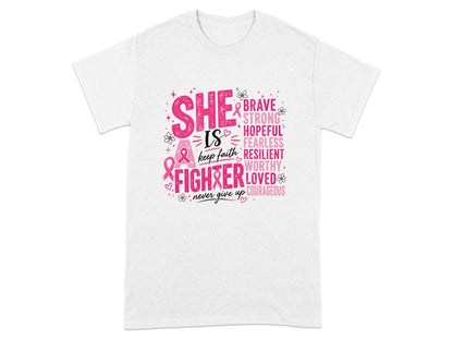 White t-shirt with "SHE IS A FIGHTER" text and empowering words.