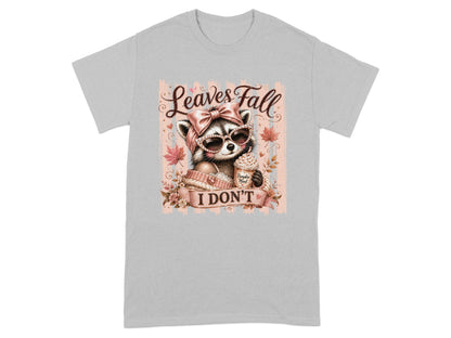 Raccoon with sunglasses and coffee, text "Leaves Fall I Don't".