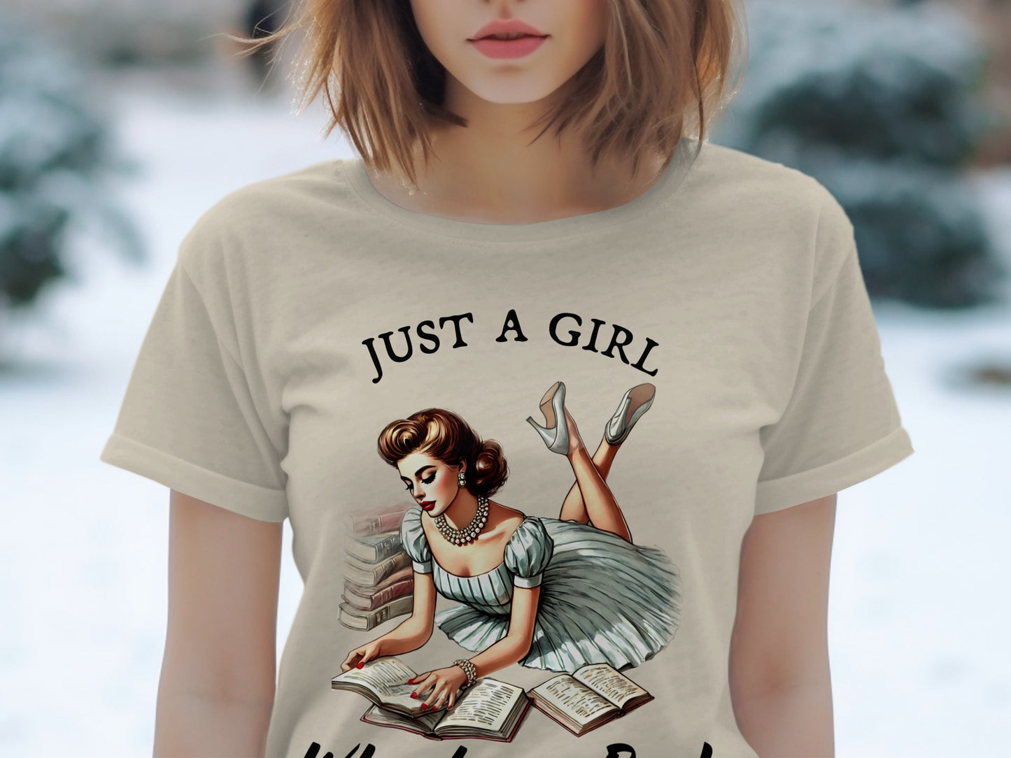 T-shirt graphic: "Just a girl" with a woman reading books.