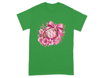 Football with pink ribbons, bow, and floral accents on a green shirt.