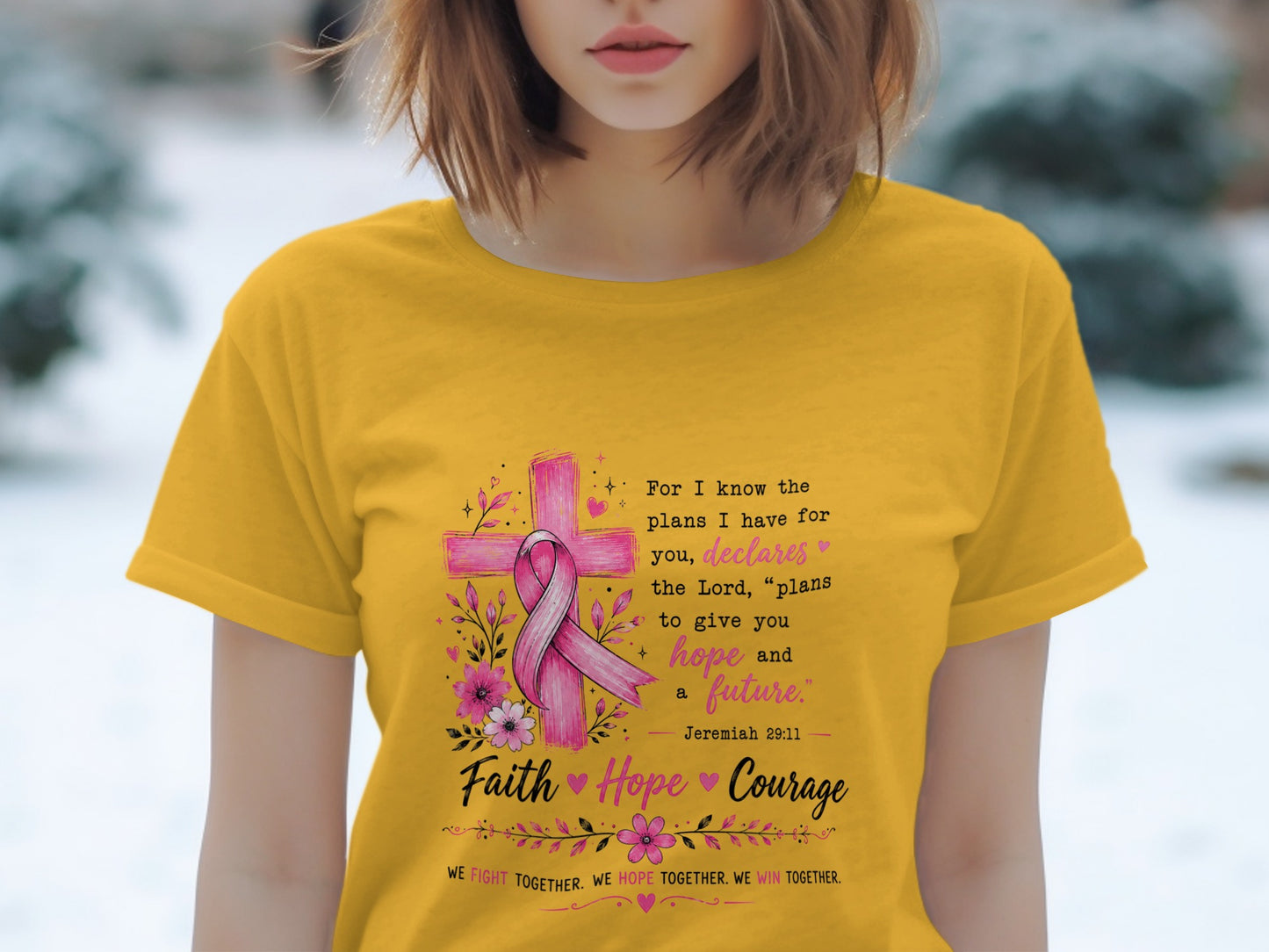 Yellow t-shirt with pink cross, ribbon, flowers, and motivational text.