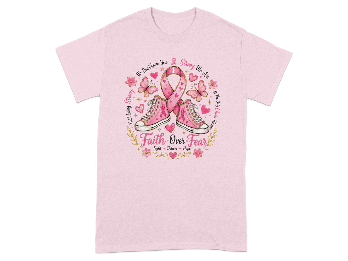 Pink t-shirt with sneakers, pink ribbon, butterflies, and text "Faith Over Fear".