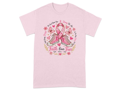 Pink t-shirt with sneakers, pink ribbon, butterflies, and text "Faith Over Fear".