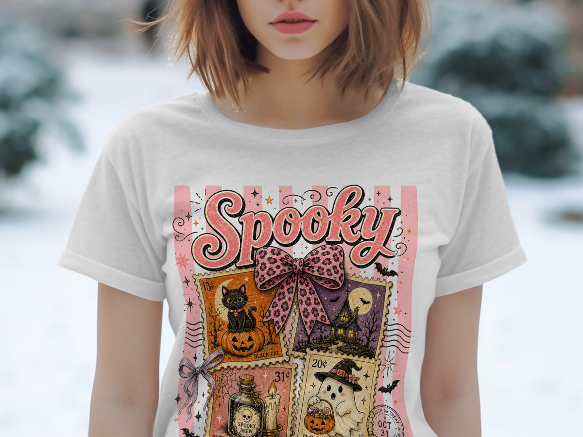 White t-shirt with "Spooky" text and four Halloween-themed postage stamps.