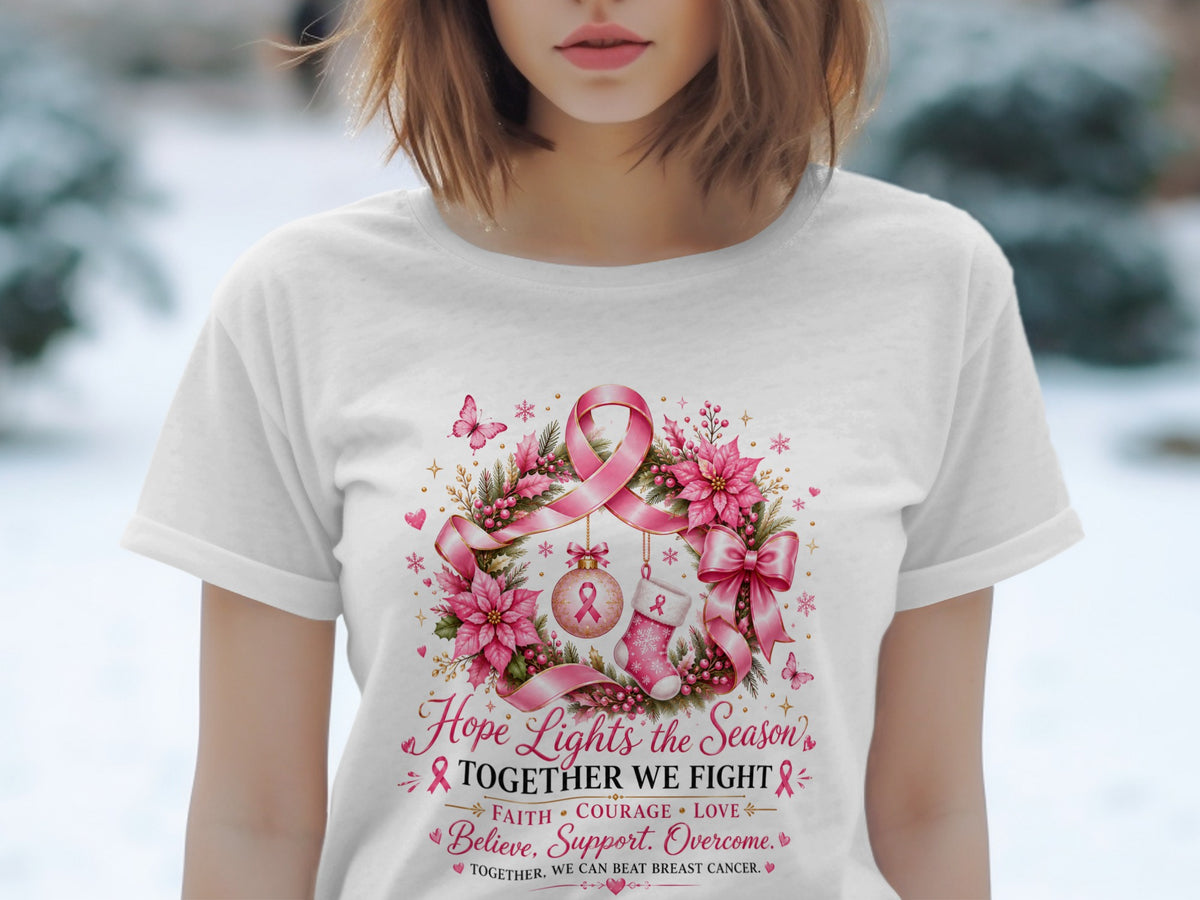 White t-shirt with breast cancer awareness design featuring pink ribbons, flowers, and text.