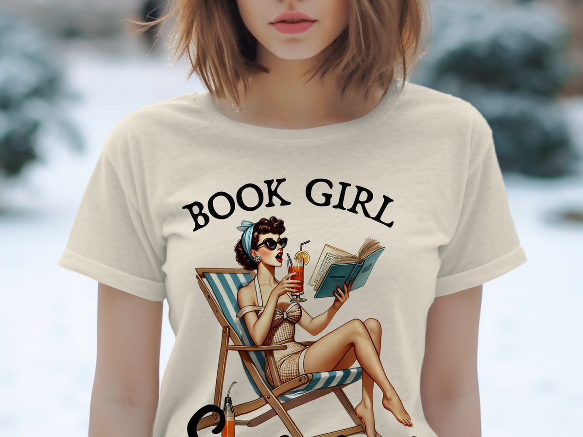 Cream t-shirt with "BOOK GIRL" text and pin-up illustration of a woman reading.