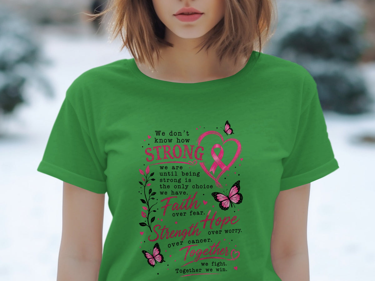 Green t-shirt with "STRONG Faith, Strength, Hope, Together" text and pink ribbon heart.