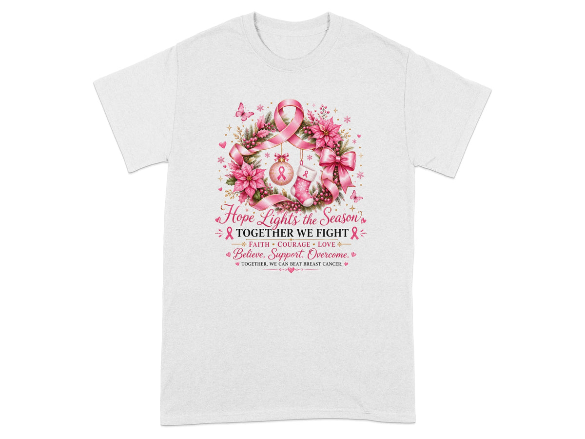 White t-shirt with wreath graphic featuring pink ribbons and text about breast cancer awareness.