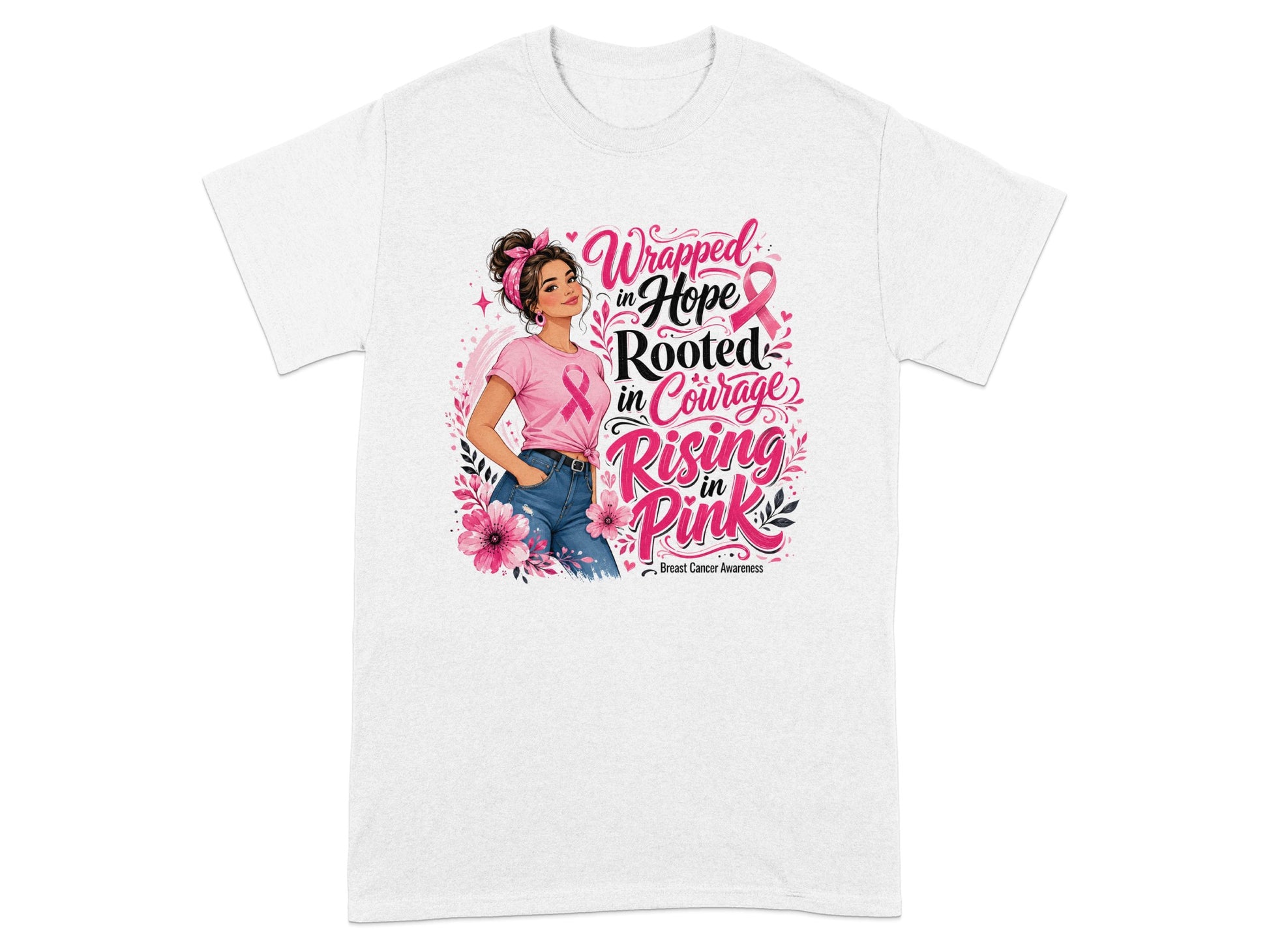 White t-shirt with graphic: "Wrapped in Hope, Rooted in Courage, Rising in Pink" and breast cancer awareness ribbon.